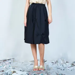 Contemporary midi skirt with tie accents wholesale
